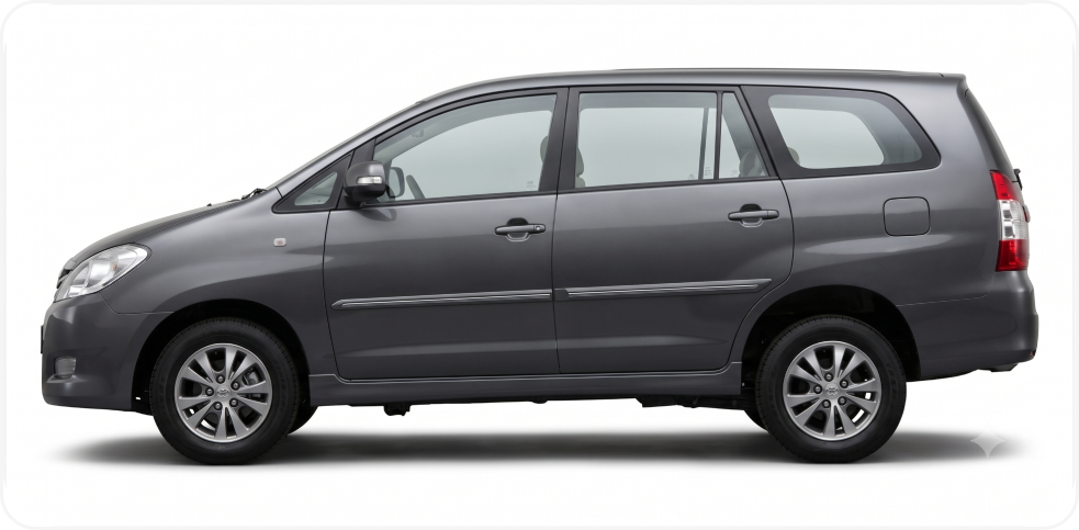 Side profile of a dark grey Toyota Innova minivan